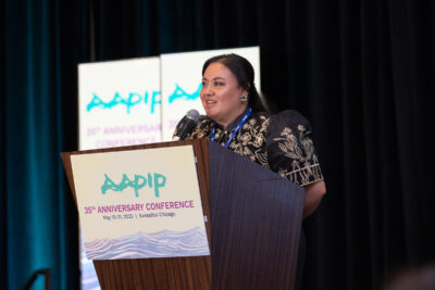 Christian Aldana giving a spoken word performance.