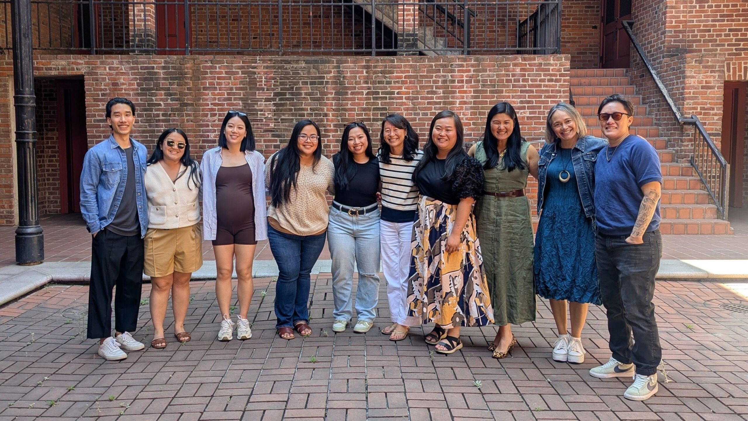 ten AAPIP team members posing for a group photo